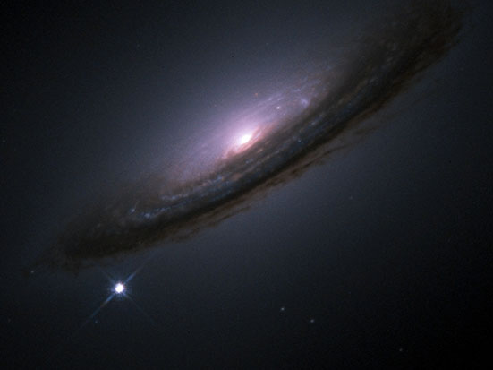 Supernova 1994D in the galaxy NGC 4526. Credits: NASA/ESA, The Hubble Key Project Team and The High-Z Supernova Search Team.